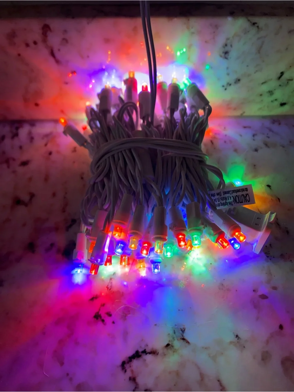 Holiday Time Multicolor LED Icicle String Lights on White Wire